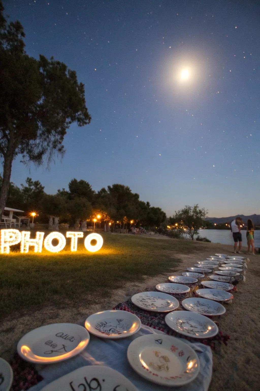 A celestial ritual performed outdoors beneath the full moon, with plates adorned with personal sentiments.