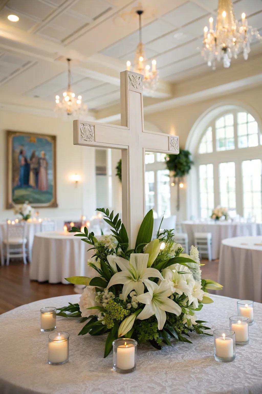A cross centerpiece is complemented by lilies and lights.