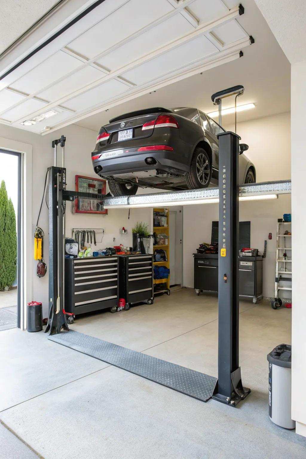 A two-column lift in a home garage provides easy access for car maintenance.