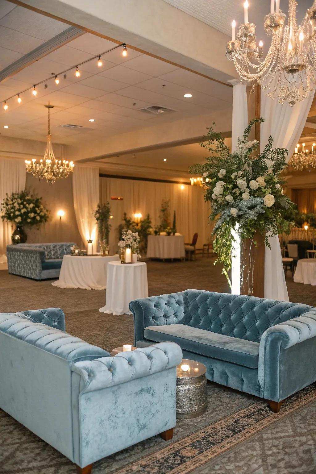 An opulent lounge zone exhibiting hazy azure velvet seating, welcoming guests to unwind and savor the celebration.