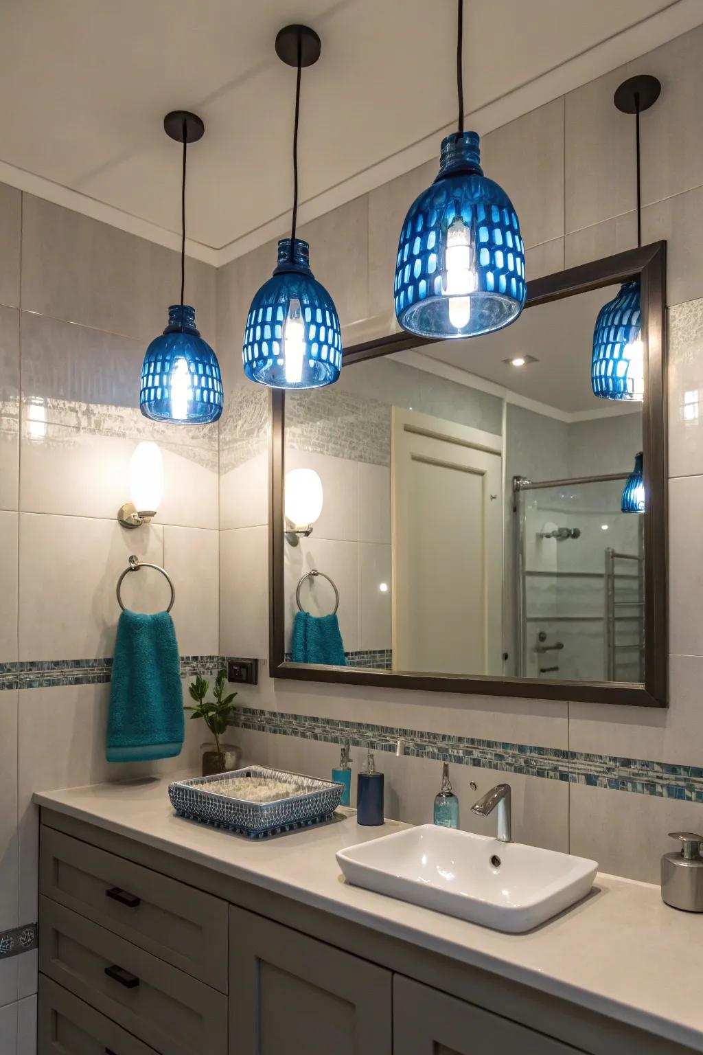 Azure suspended illumination brighten and introduce a dash of hue to this exquisite bathroom.
