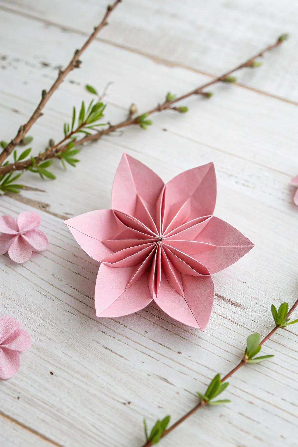 Cherish the timeless beauty of a cherry blossom with this exquisite paper-crafted flower, fusing Scandinavian simplicity with bohemian charm.