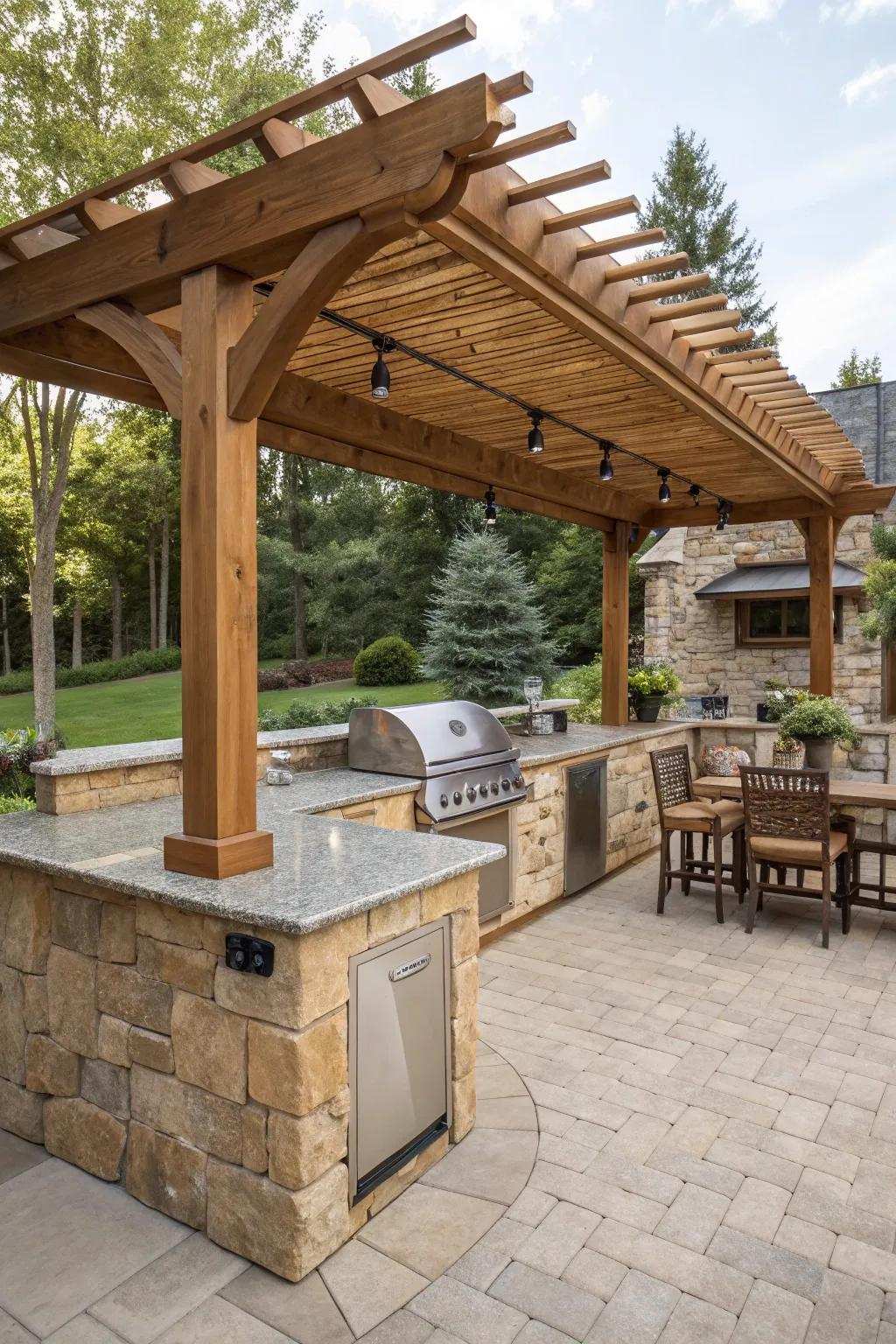Classic wooden pergola gracing an outdoor kitchen with a stone countertop.