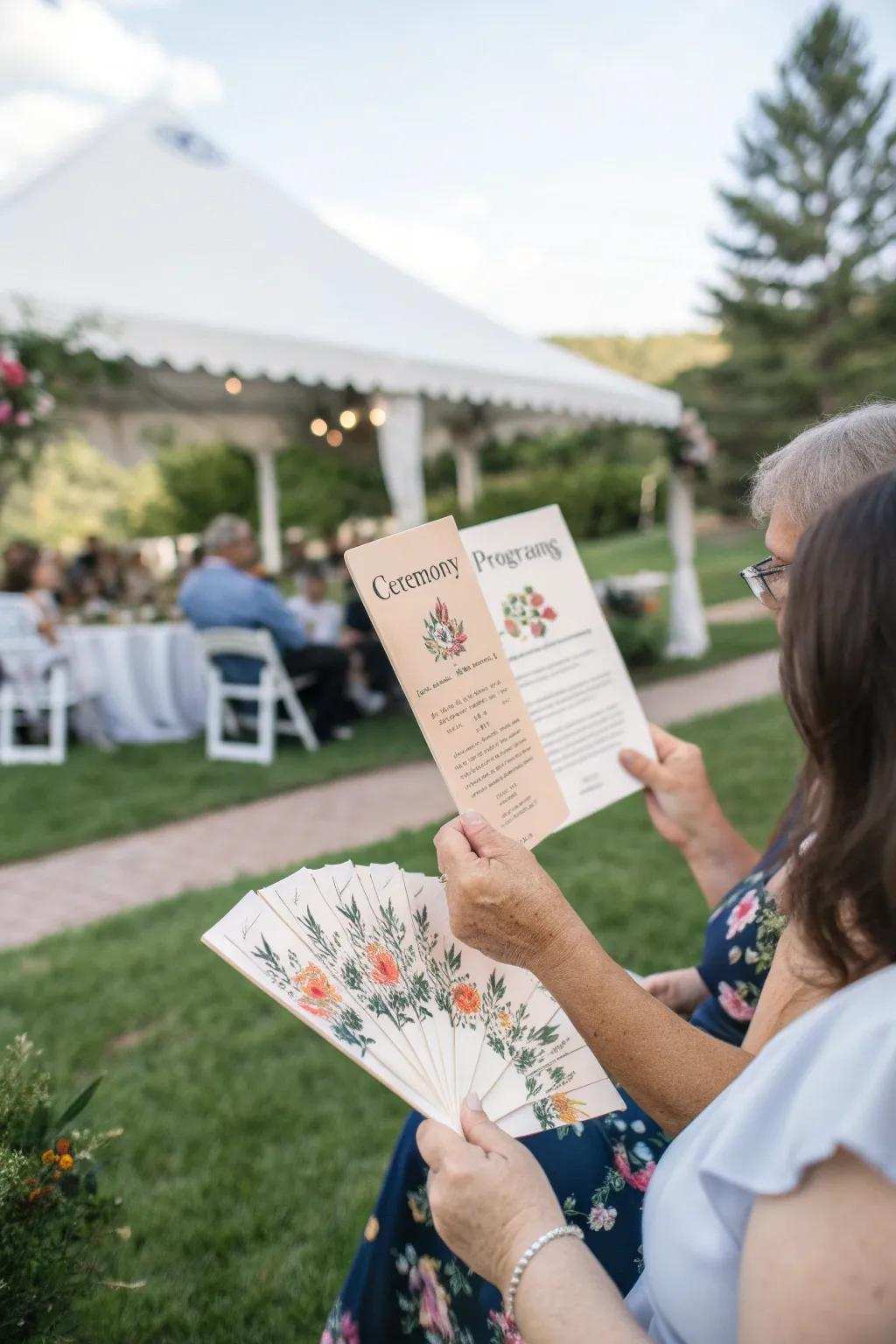 Custom ceremony guides serve as keepsakes and functional fans.
