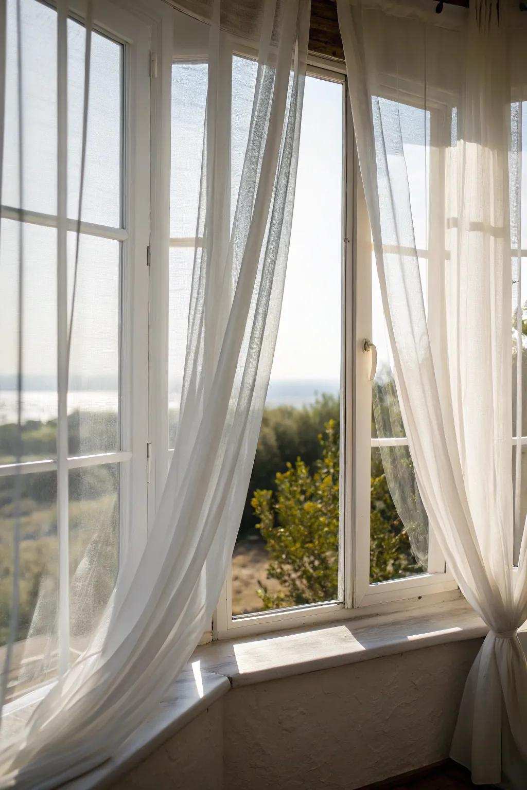Ethereal fabrics contribute to the subtlety of corner windows.