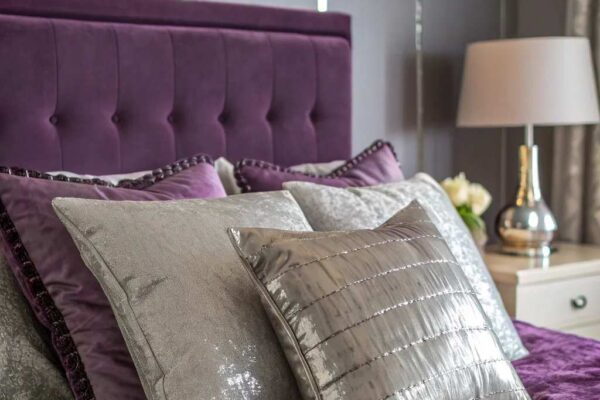 Grey Bedrooms with Bold Purple Accents