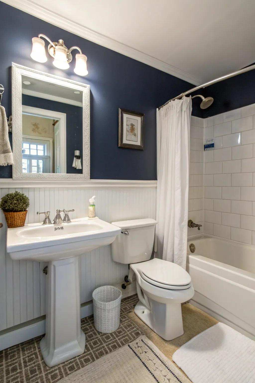 Navy walls establish a dramatic and opulent atmosphere within this modern bathroom.