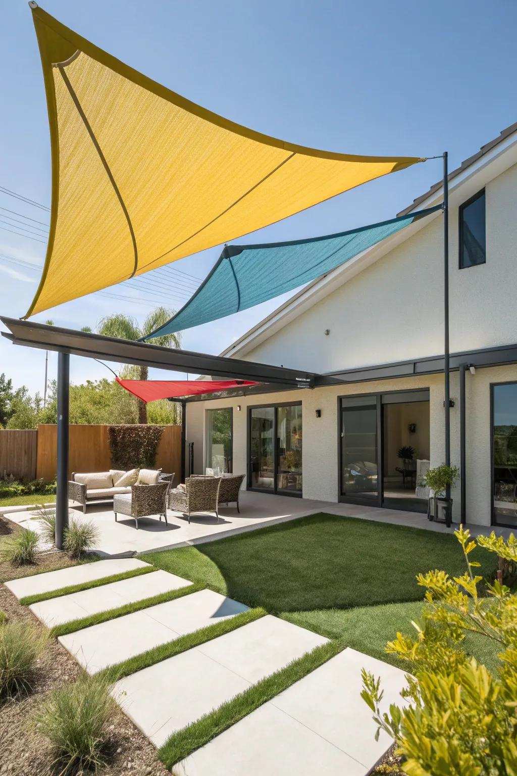 Shade sails provide modern appeal and privacy.