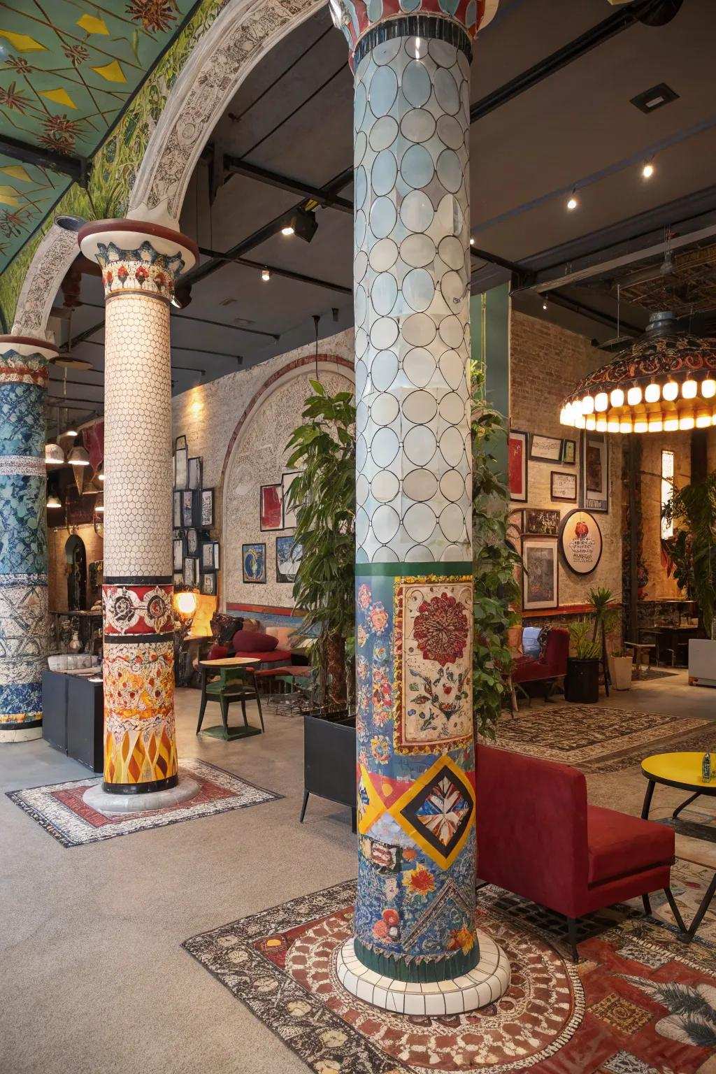Tile-covered columns introducing vibrant artistry into an eclectic interior.
