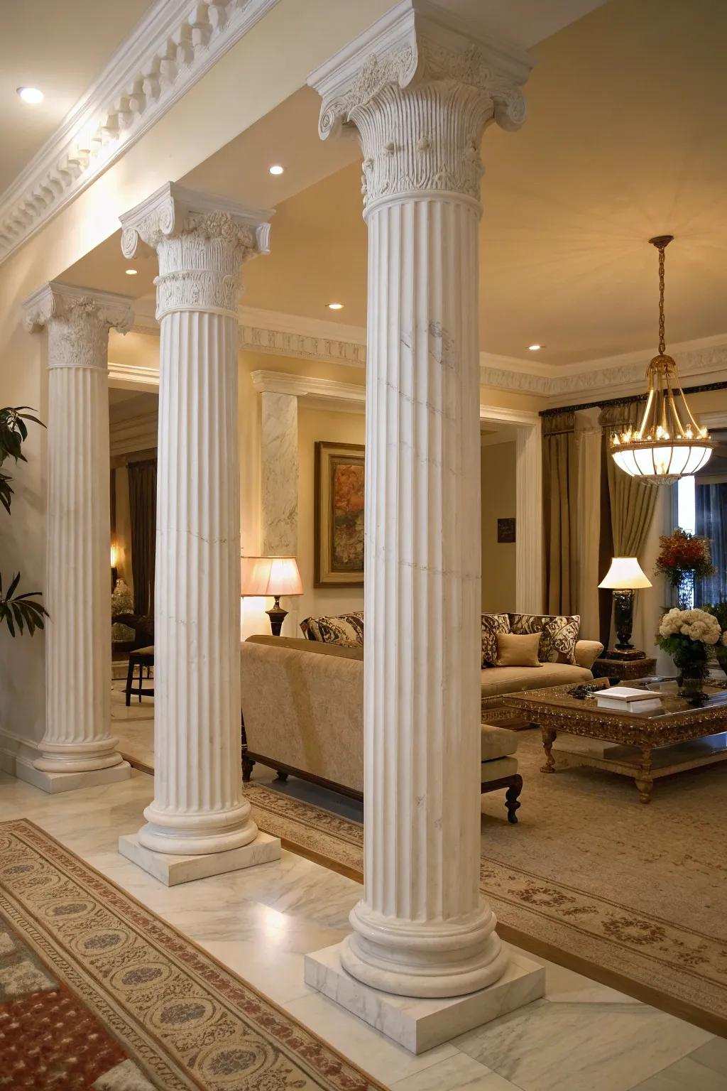 White marble grooved pillars enhancing a contemporary living area with a classical touch.